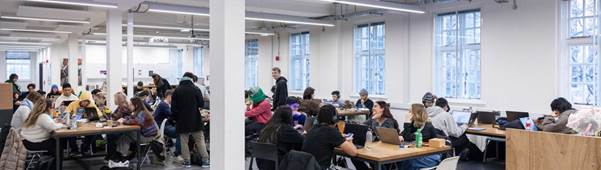 Students in the common area of level 1 dyson building